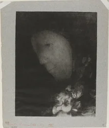 Testa di donna con corsage di fiori