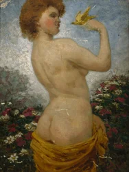 Donna nuda con un uccello nel verde