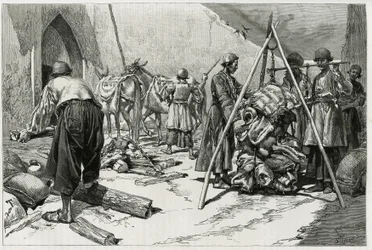 La pesatura dei bagagli prima della partenza della spedizione nuziale Delafoy. Incisione di Tofani, per illustrare la storia 