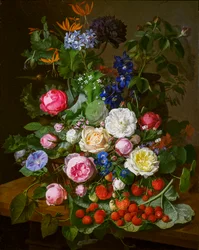 Un cesto con rose e altri fiori