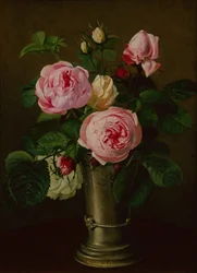 Rose in un vaso di peltro