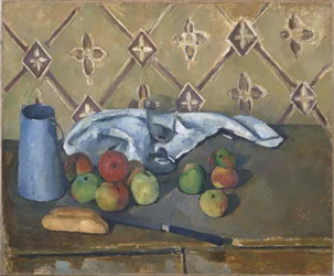 Frutta, tovagliolo e brocca di latte