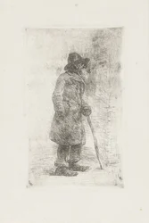 Uomo in piedi con pipa