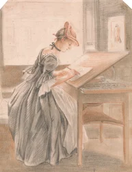 Una signora che copia a un tavolo da disegno