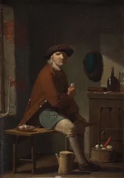 Un uomo che fuma la pipa