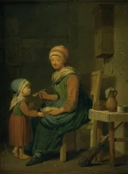 Una contadina che dà da mangiare a sua figlia