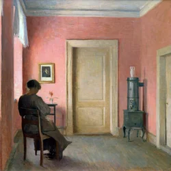 Donna seduta in un interno