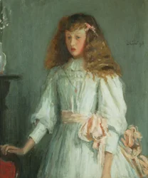 Una giovane ragazza in un vestito bianco