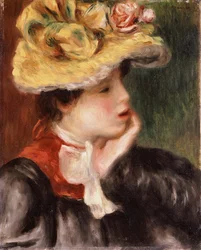 Testa di una ragazza con un cappello giallo