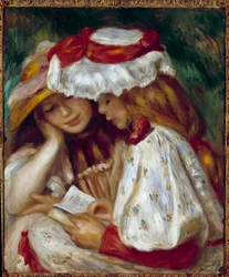 Due giovani ragazze che leggono