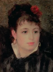 Donna con una rosa nei capelli
