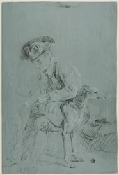 Uomo seduto con cane