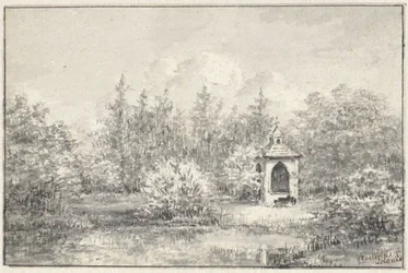 Veduta nel parco di Leiduin, con una casetta tra gli alberi