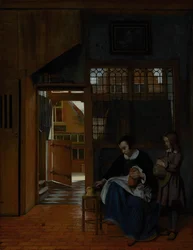 Una donna che prepara pane e burro per un ragazzo, c.1660-3