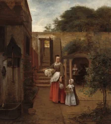 Donna e bambino in un cortile