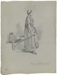 Donna in piedi che tira un carretto a Utrecht