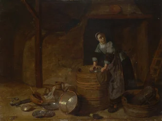 Una donna che strofina una pentola