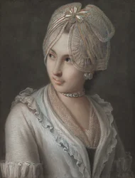 Una giovane elegante con un cappello di pizzo