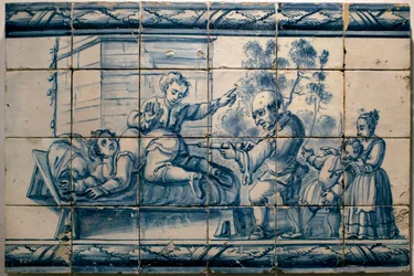 Il medico pratica un clistere a un paziente - Pannello satirico di Lisbona, prima metà del XVIII secolo (Medico - Pannello satirico, prima metà del XVIII secolo) - Museo nazionale degli azulejos, Lisbona (Portogallo)