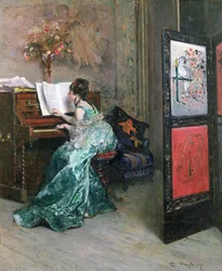 Signora che suona il pianoforte in un interno