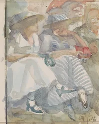 Due donne sedute in prima fila in un pubblico