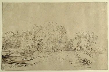 Canale con barche, una strada sul dyke e alberi