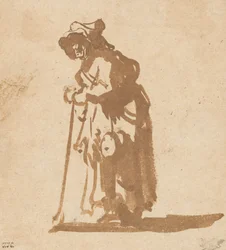 Mendicante donna appoggiata a un bastone