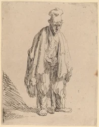 Mendicante con un cappello alto, in piedi e appoggiato a un bastone