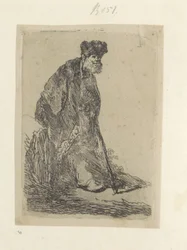 Uomo in piedi con un lungo mantello e cappello di pelliccia