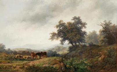 Paesaggio aperto con mucche e mandriano