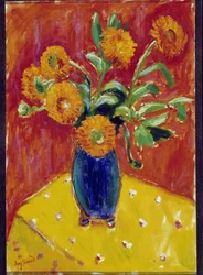 Bouquet di peonie in un vaso blu