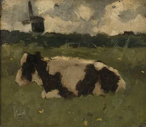 Mucca riposante con un mulino