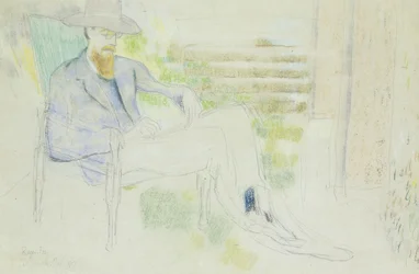 Lytton Strachey che scrive in giardino