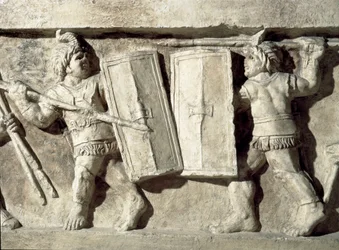 Basso rilievo rappresentante una battaglia di gladiatori. I secolo d.C. Roma, Museo della Civiltà Romana