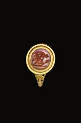 Anello romano in pietra in montatura moderna