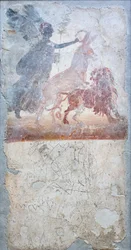 Un asino che penetra un leone è incoronato dalla dea Vittoria, sotto un graffito con combattimento gladiatorio, insigna di un negozio