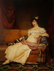 Lady Waterhouse seduta su un divano con il suo spaniel