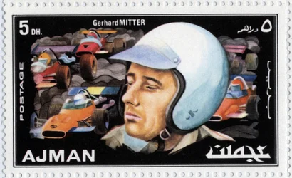 Francobollo degli Emirati Arabi Uniti che rappresenta il pilota Gerhard Mitter (1935-1969)