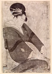 Donna giapponese seduta