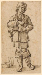 Un giovane contadino con in mano un vaso