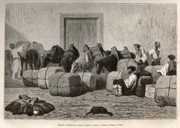Quando le carovane turche arrivano alla dogana di Sebenico (Serbia), i viaggiatori commerciali scaricano le balle dal dorso dei loro cammelli per verificare la quantità e la natura delle merci. Incisione dopo il disegno di Theodore Valerio, per illustrare 