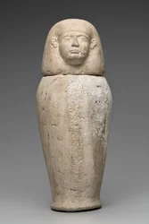 Vaso canopo con testa di uomo (calcare)