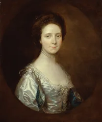 Elizabeth Parry con un vestito bianco e maniche blu