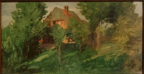 Casa rossa dietro gli alberi
