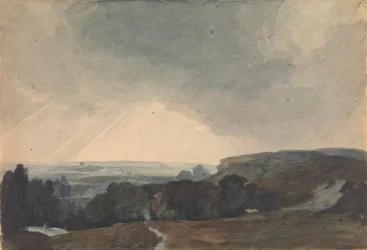 Scena paesaggistica dalla cima di una collina, guardando nella valle illuminata dal sole
