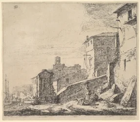 Una donna in piedi accanto a un uomo seduto