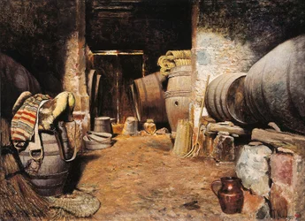 Interno di una cella. Fienile con barili e sella di cavallo