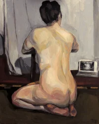 Donna nuda con un portatile