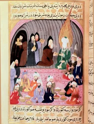 Il profeta Muhammad (Muhammad o Muhammad) (570-632), con il volto coperto, in viaggio verso la Siria viene accolto da monaci cristiani che gli servono un pasto. Miniatura turca del XVIII secolo. Museo Topkapi, Istanbul, Turchia