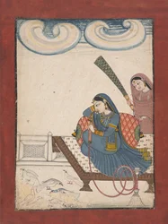 Una signora che guarda le colombe